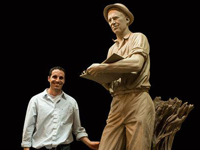 Sculptor Benjamin Victor is pictured with his statue of Iowa-born scientist Norman Borlaug, which is scheduled to be unveiled Tuesday. (Photo courtesy of the U.S. Botanic Garden)
